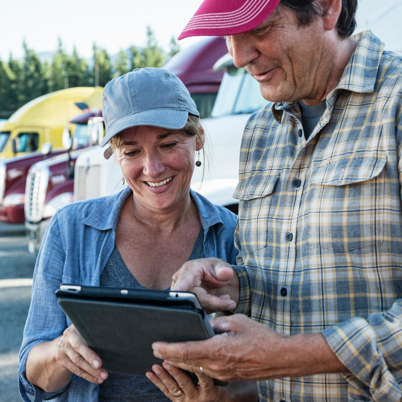 caucasian-woman-and-man-truck-driving-team-working-2025-04-04-13-38-42-square