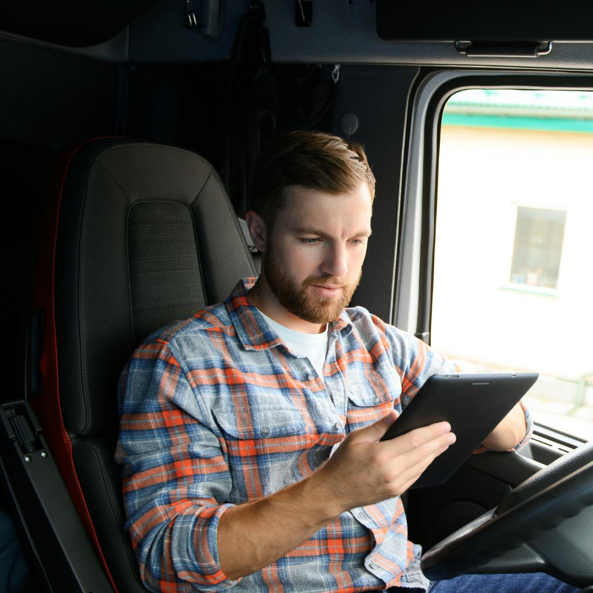 man-truck-driver-sitting-behind-wheel-of-car-and-h-2025-03-14-04-38-13-square